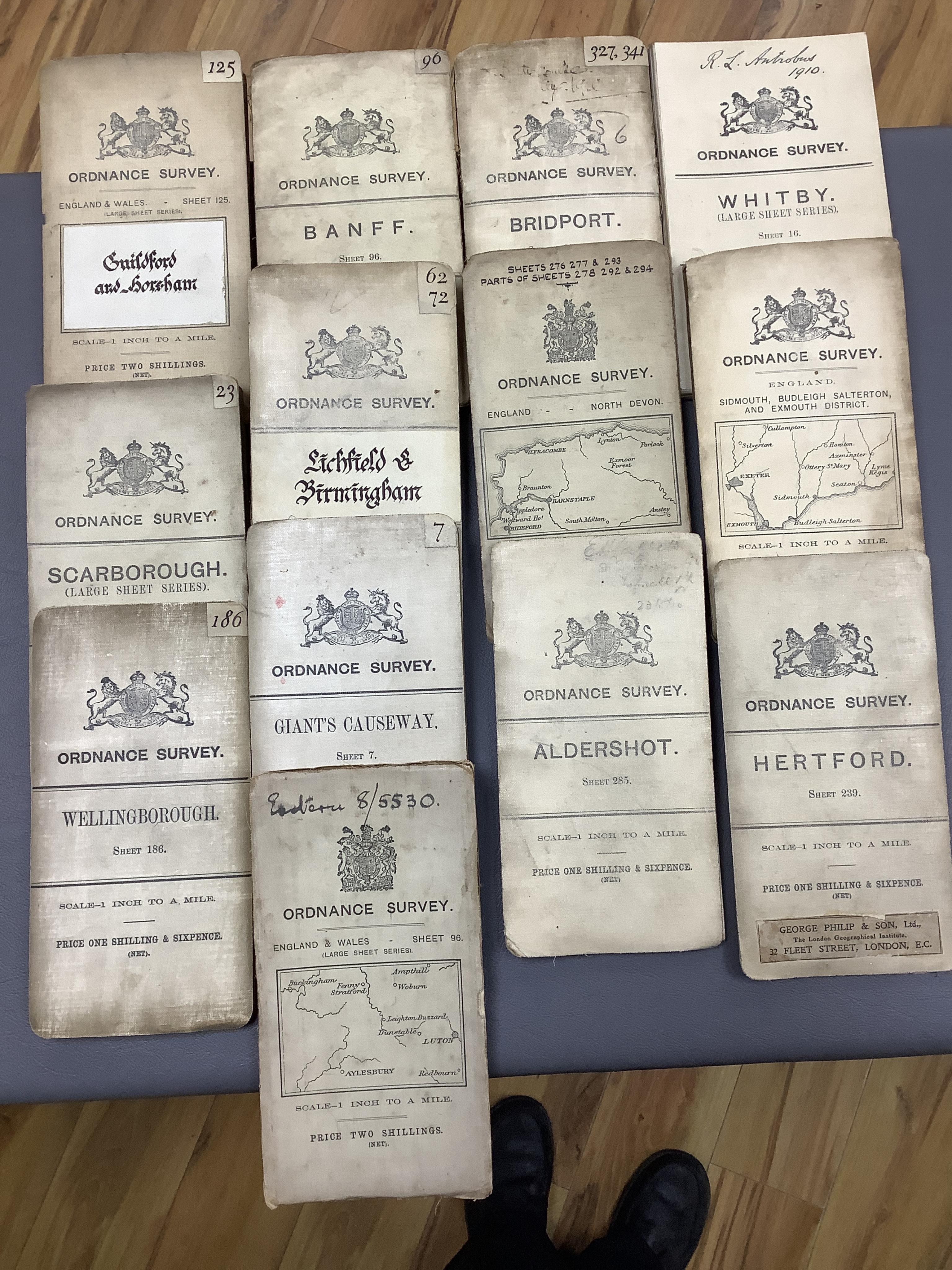 Forty-four early Ordnance Survey maps on cloth backing, 1 inch to a mile. Condition - fair.